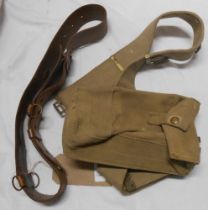 A leather military belt - sold with a canvas belt and attached canvas pouch