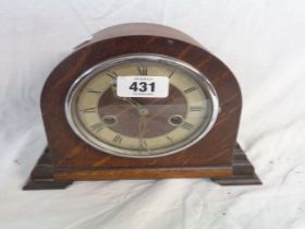 A vintage oak cased Enfield mantel clock (gong missing), with eight day movement