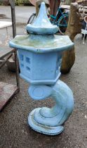 An Oriental style blue painted garden ornament of pagoda form