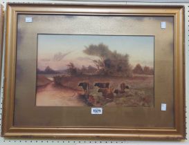 C. Rowden: a gilt framed and slipped watercolour, depicting cattle watering at dusk in a river