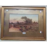 C. Rowden: a gilt framed and slipped watercolour, depicting cattle watering at dusk in a river