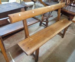 A 1.52m Victorian pine form style chapel pew with book rest to back and moulded solid seat, set on