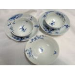 A pair of 18th Century Worcester porcelain tea bowls and saucers, with blue painted floral