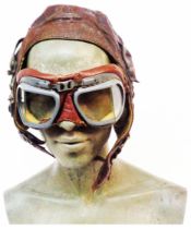 An old leather flight helmet - sold with a similar age pair of pilot goggles with a later applied