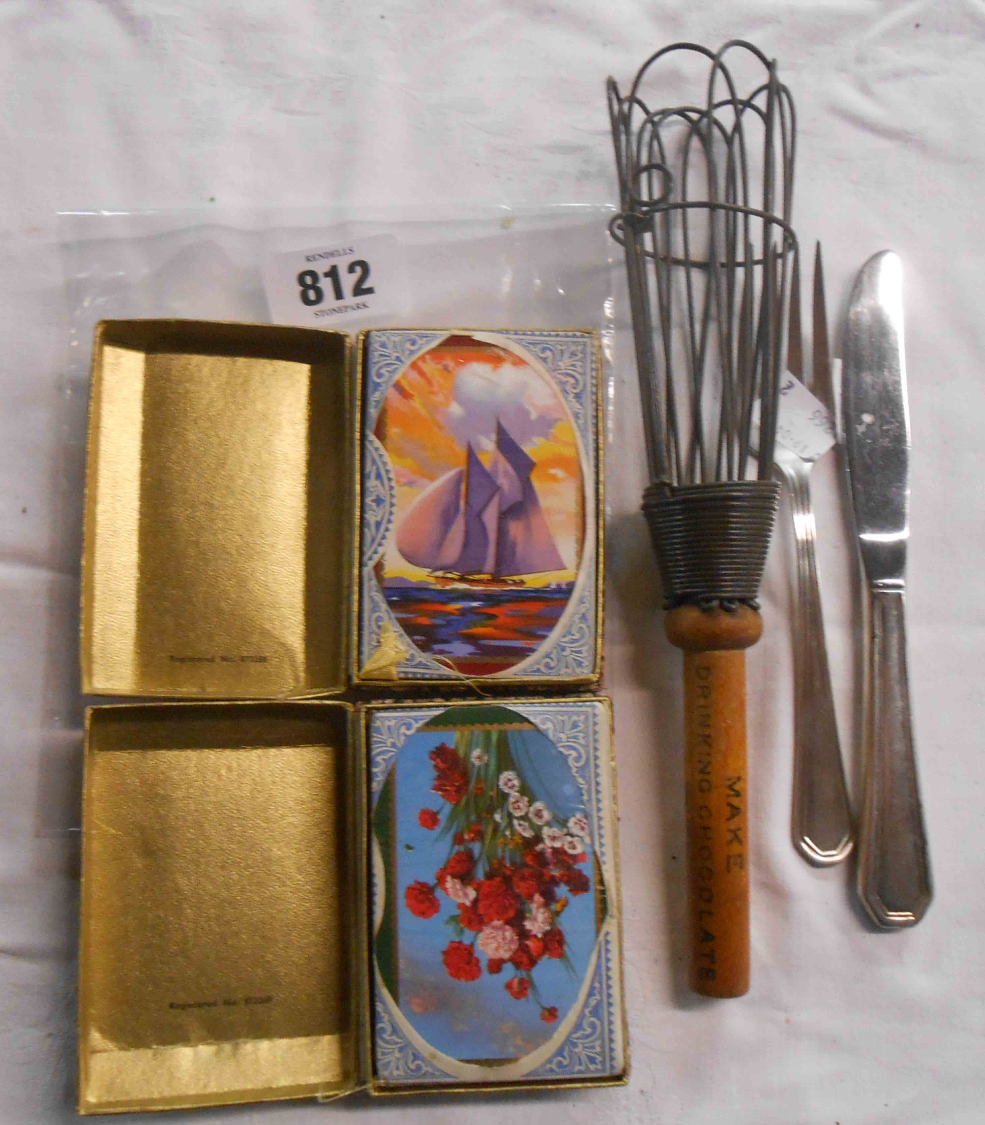 A vintage Bournville coco whisk - sold with two packs of playing cards and a Lufthansa knife and