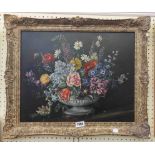 Shielo: an antiqued framed oil on panel still life with urn of flowers on a surface and black