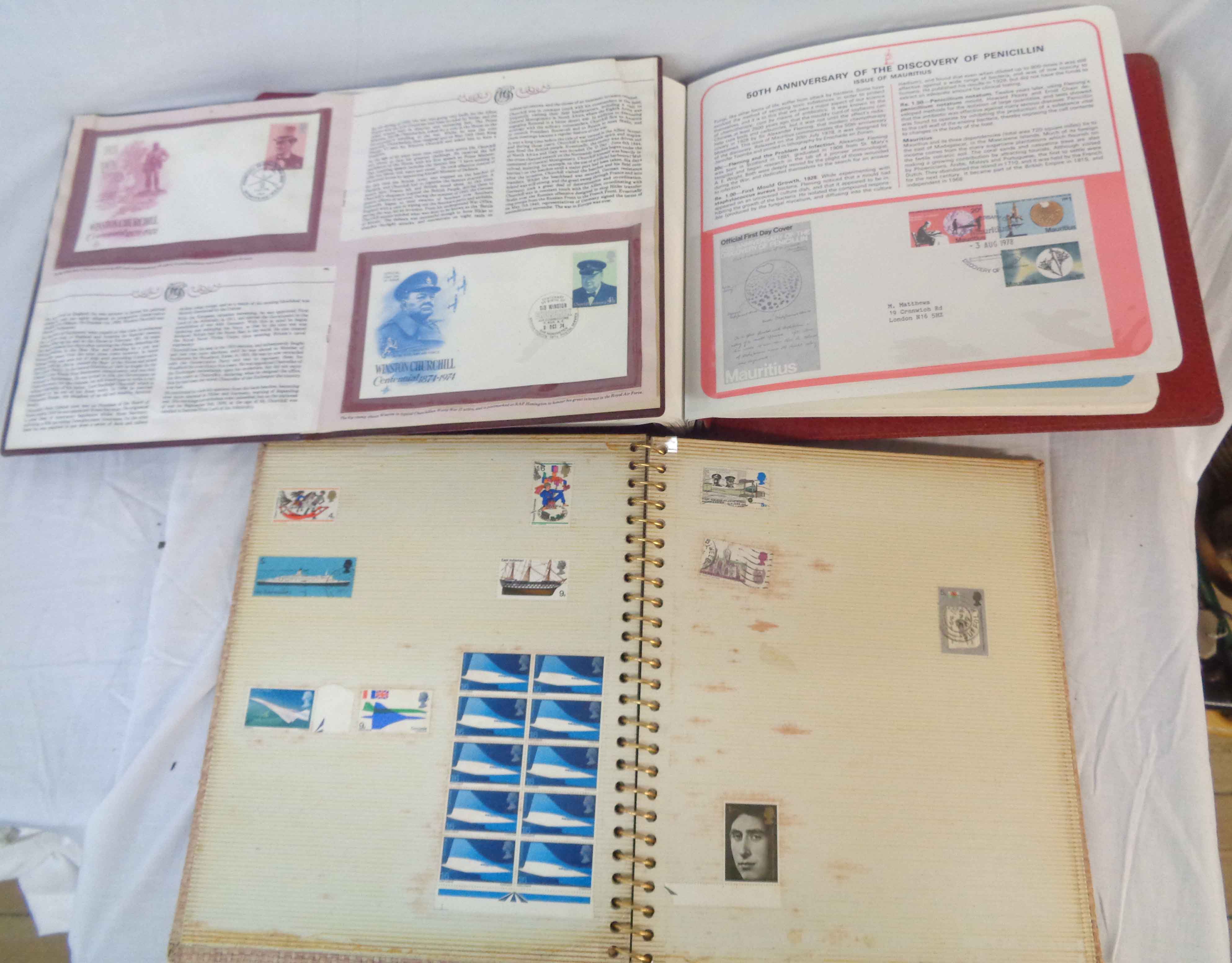 A stamp album containing British pre-decimal and decimal stamps, Postal Heritage Society of