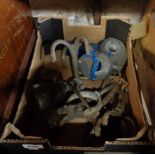 A box containing boat rowlocks, hooks, etc.