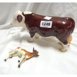 A Beswick Polled Hereford bull figurine model No. 2549A - sold with a calf model (a/f)