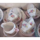 An early 20th Century Shelley bone china part tea set comprising six trios and a bread and butter