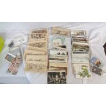 A shoe box containing a collection of early 20th Century and other postcards including