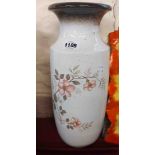 A mid 20th Century West German pottery vase with floral decoration on an oatmeal ground