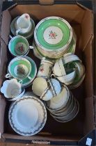 A box containing a quantity of bone china teaware