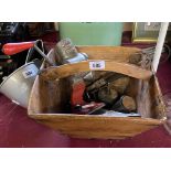 A vintage Chinese rice bucket containing Spong grater, a cast metal fairground door stop, etc.