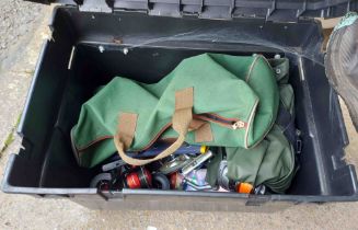 A plastic fishing box/seat containing a quantity of fishing related items including fishing