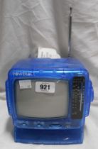A vintage Power Act mini personal Television with AM/FM radio