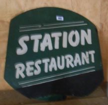 A vintage painted wood Station Restaurant sign with white transfer lettering - a/f
