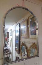 A reproduction chrome plated framed wall mirror with arched plate and part beaded border