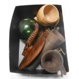 A box containing a quantity of carved wooden items including a pair of decorative wall hangings,