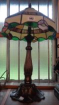 A contemporary Tiffany style coloured glass lamp shade