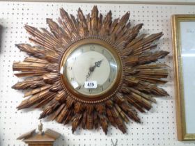 A 56cm vintage Smiths Sectric ornate gilt sunburst wall timepiece - sold as a collector's item
