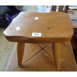 A modern rustic solid elm topped stool, set on simple turned legs