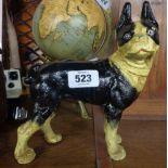 A modern painted cast metal French bulldog