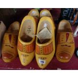 Three pairs of Dutch wooden clogs with painted decoration