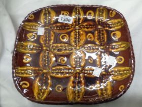 A John Pollex Plymouth Studio Pottery dish of square form with pie crust rim and stylised repeat