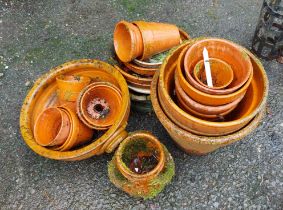 A quantity of terracotta pots