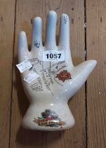 A modern ceramic palmistry hand with crackle glaze finish