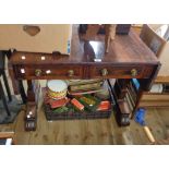 An 87cm 19th Century rosewood sofa table with two frieze drawers, set on flanking standard ends with