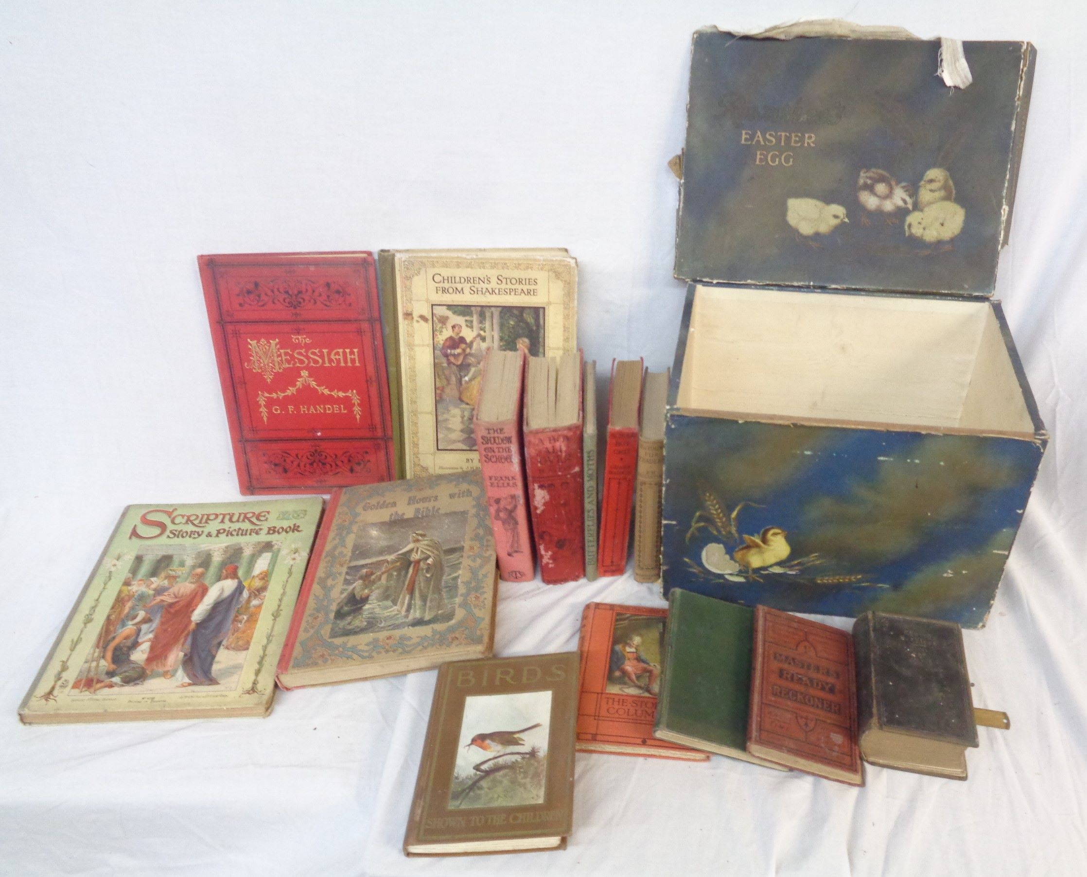 A vintage Rowntree's Easter Egg box containing a small collection of children's religious and