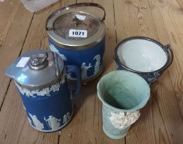A Wedgwood blue Jasperware dip biscuit barrel with silver plated mounts, a similar hot water jug and