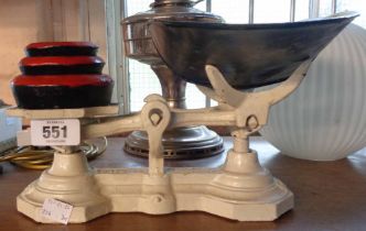 A vintage set of cast iron Mack Australian kitchen scales and weights