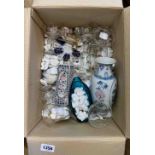 A box containing a quantity of glassware and ceramics including vintage Babycham and Britvic