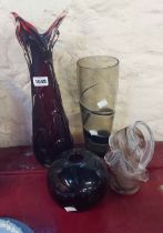 Four pieces of vintage art glass comprising a large ruby glass vase with clear cased knobbly