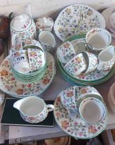 A quantity of Minton bone china decorated in the Hadden Hall pattern including teapot, milk jugs,