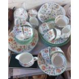 A quantity of Minton bone china decorated in the Hadden Hall pattern including teapot, milk jugs,