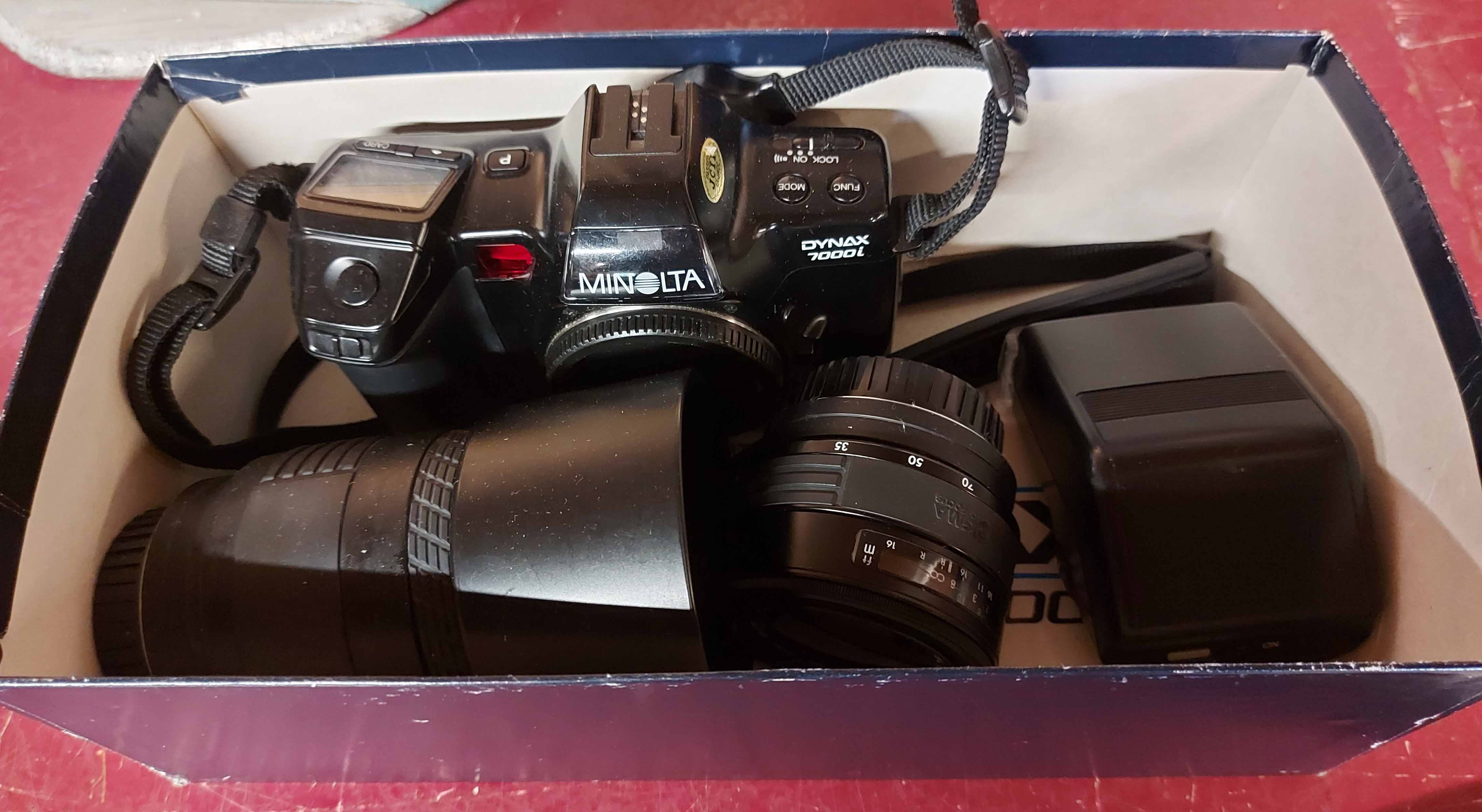 A Minolta 700 camera - sold with two lenses, etc.