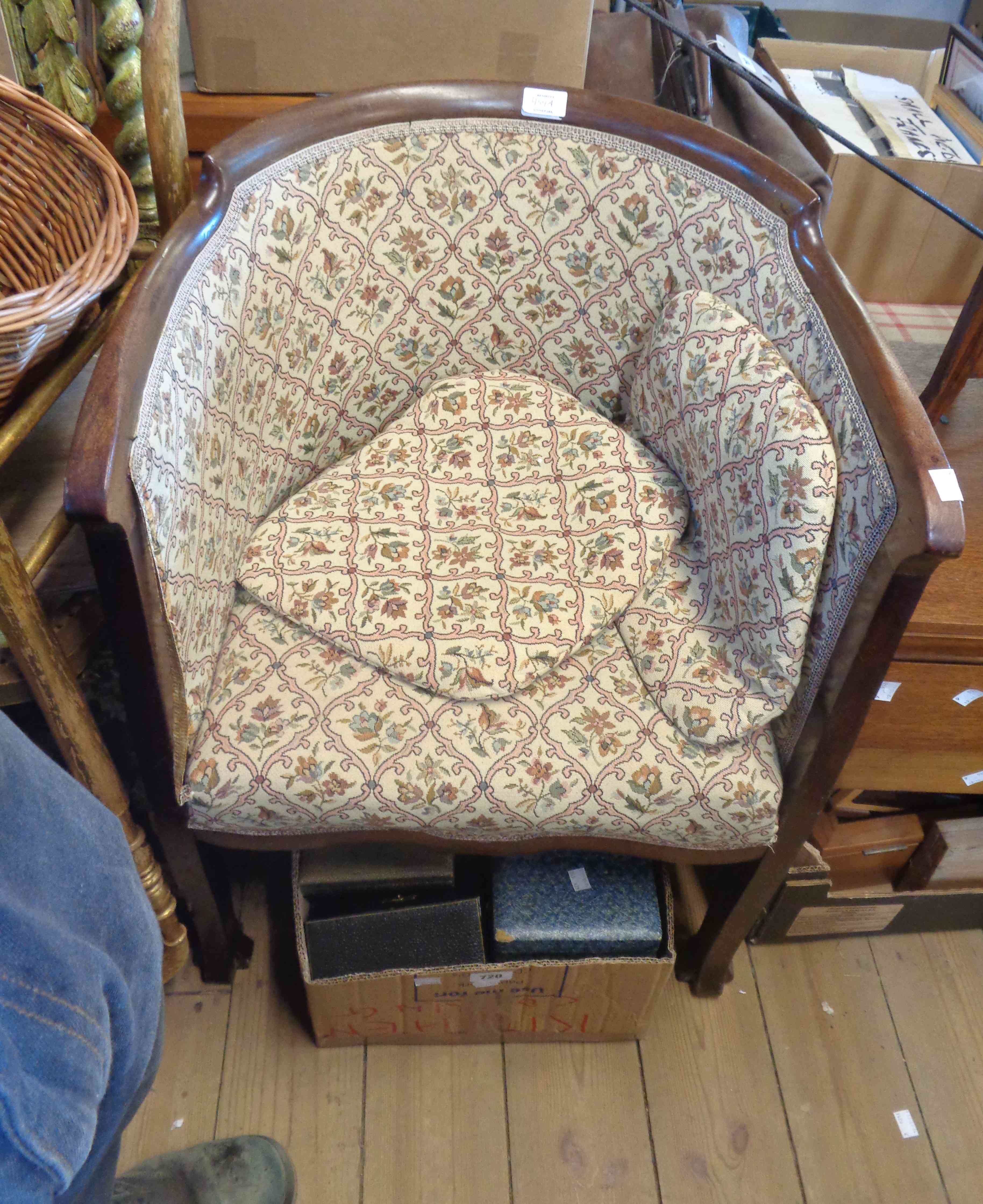 An early 20th Century mahogany part show frame tub elbow chair with upholstered back and seat, set