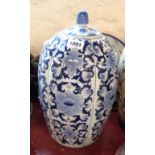 A modern Chinese porcelain lidded jar of melon form with blue decoration