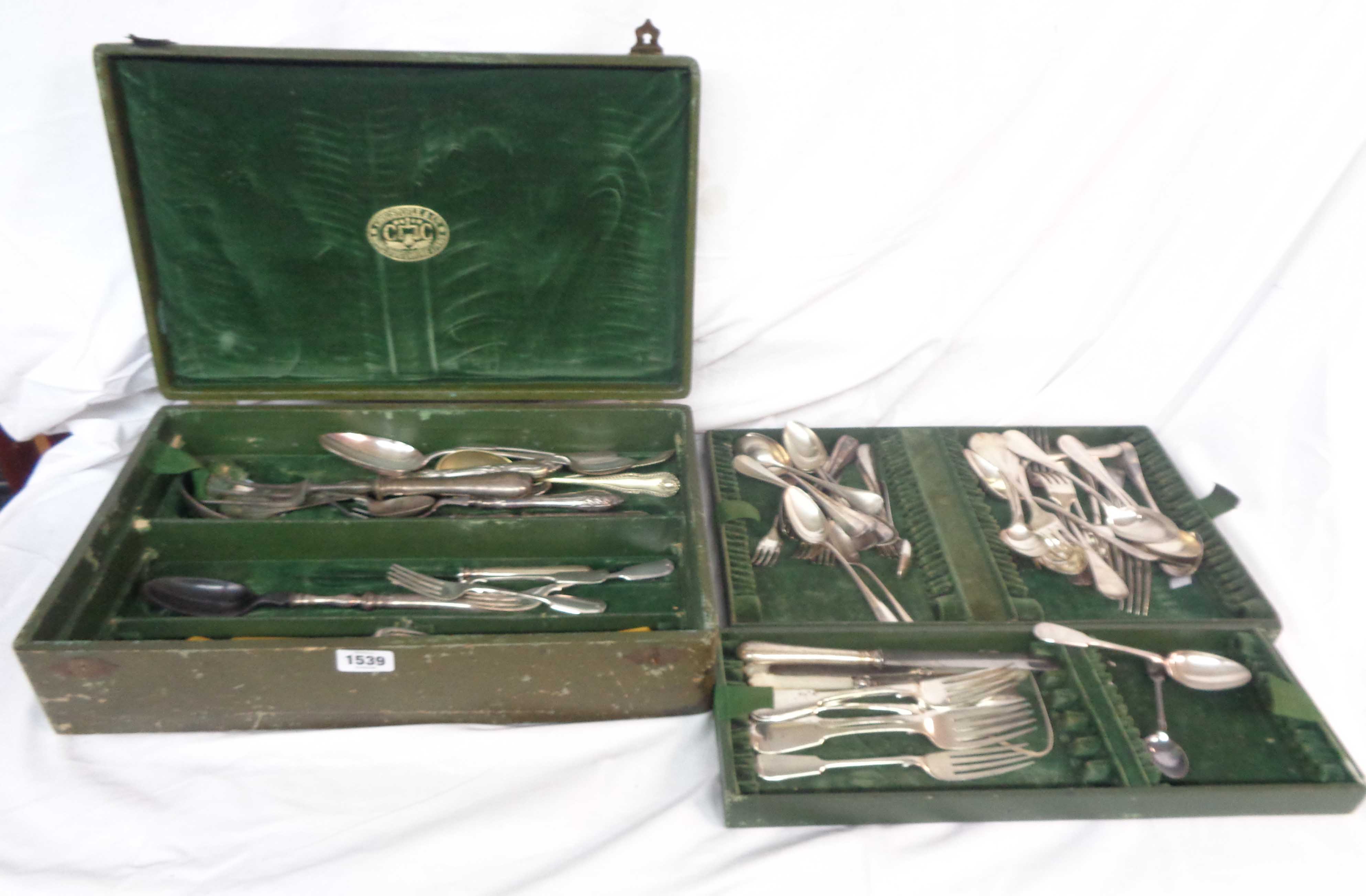 A Christofle tray fitted canteen containing a quantity of French and English silver plated cutlery