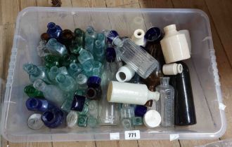 A large quantity of stoneware inks and antique glass bottles, etc.