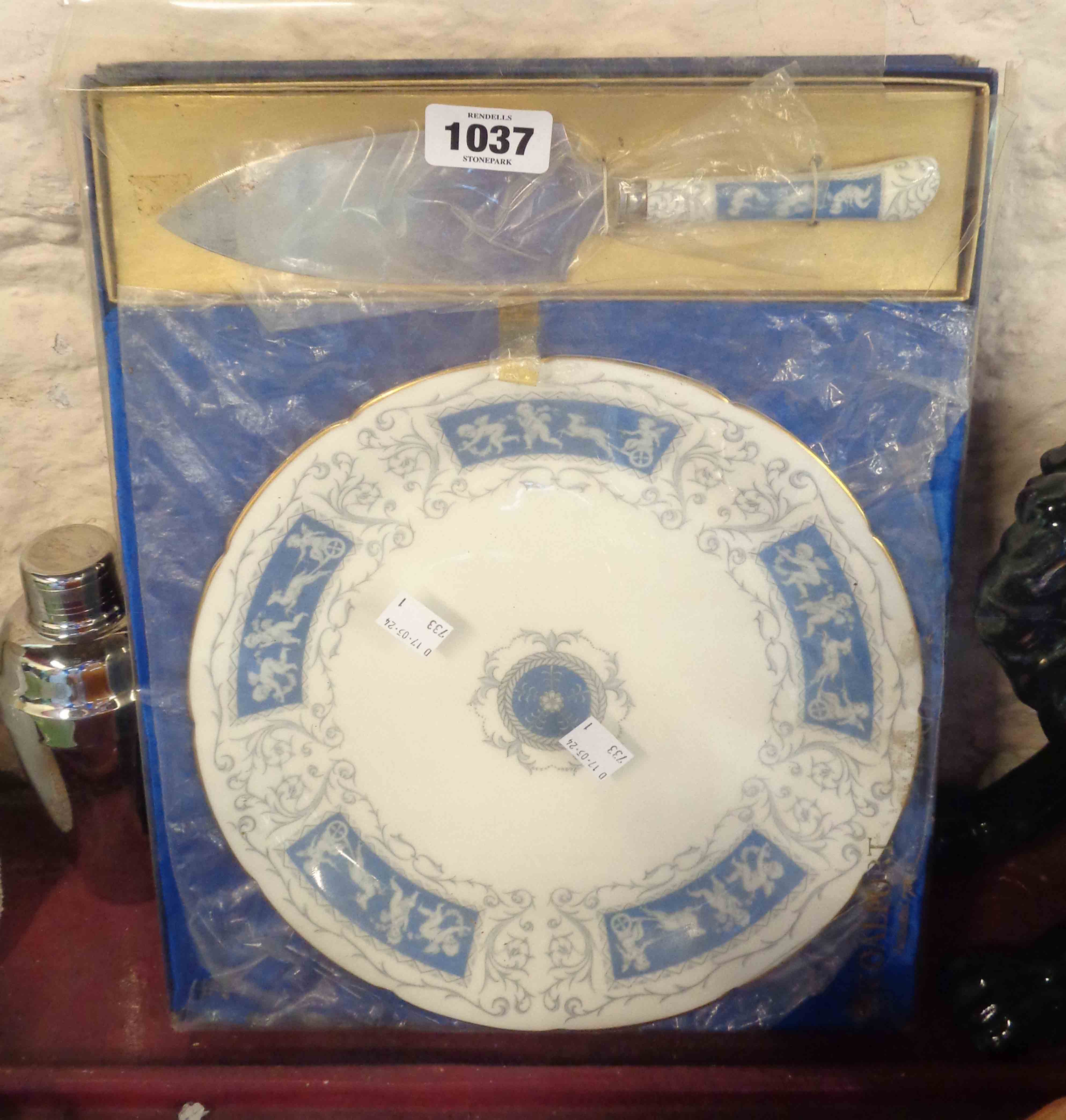 A Coalport bone china cake plate and slice, decorated in the Beverly pattern, in its original