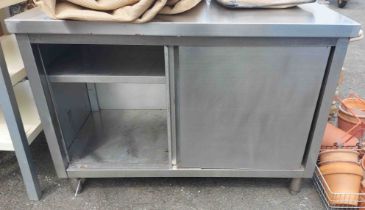 A stainless steel kitchen cabinet - sold with a large kitchen draw unit and a shelf unit