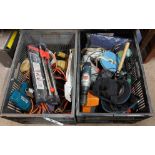 Two crates containing tools including drills, battery chargers, etc.
