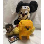 A vintage Mickey Mouse toy - sold with a yellow battery powered dog and a Nyform troll