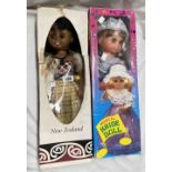 Two vintage boxed dolls comprising a musical bride doll and a New Zealand Maori doll