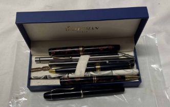 A vintage Parker 'Duofold' fountain pen and matching roller ball pen with marbled finish - sold with